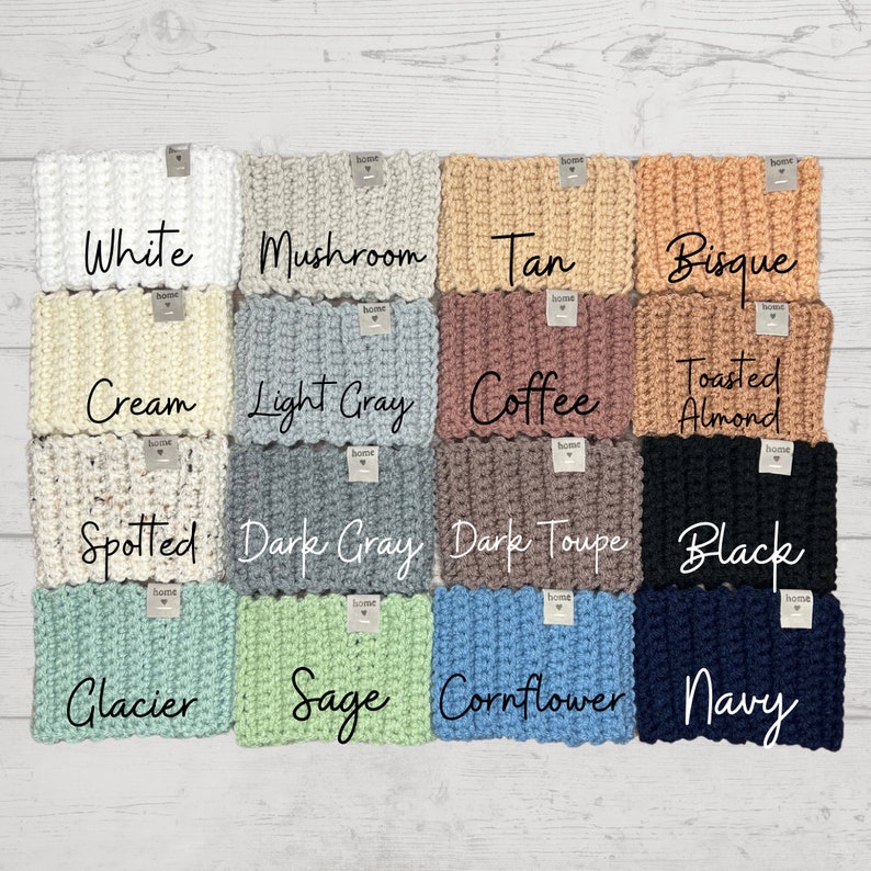 May include: A colour chart of 12 crocheted headbands in various colours, including white, cream, spotted, glacier, sage, cornflower, navy, mushroom, light grey, dark grey, dark taupe, tan, bisque, coffee, toasted almond, and black.