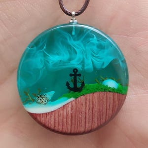 Glow in the Dark ankerketting – Handgemaakte oceaanharshanger met schelp, zeezand en hout