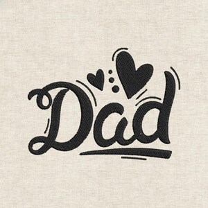 May include: Black embroidered text on a light beige fabric reads "Dad" in a stylized script, with three hearts above the word. The design features a decorative flourish and a solid underline.