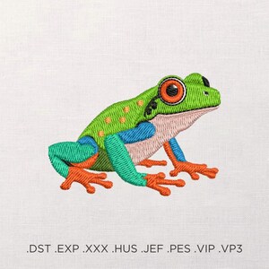May include: Embroidered image of a vibrant green tree frog with orange eyes, blue and teal accents, and orange feet. The frog is detailed with textured stitching, set against a white background. The image includes file type extensions at the bottom.