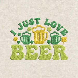 May include: Embroidered design with the text "I JUST LOVE BEER" in green and yellow. The design includes three beer mugs and shamrocks. The background is a light beige fabric.