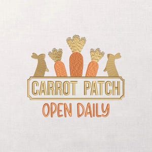 May include: Embroidered design featuring a carrot patch theme. The image includes orange carrots with green tops, two gold-colored rabbits, and the text "CARROT PATCH OPEN DAILY" in a gold and orange color scheme.
