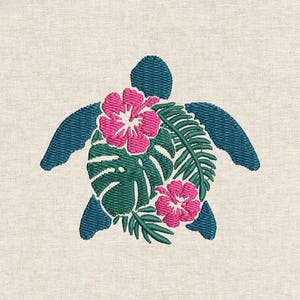 May include: Embroidered design of a teal blue sea turtle, featuring a shell filled with pink hibiscus flowers and green tropical leaves. The design is on a light beige fabric, creating a tropical theme.