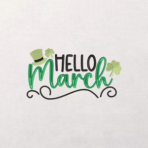 May include: Embroidered design with the words "HELLO March" in black and green. A green top hat and shamrocks are included in the design. A black curved line is at the bottom of the design.