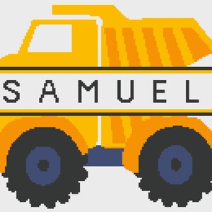 Könnte beinhalten: Ein gelber Spielzeug-Kipplaster mit schwarzen Rädern und einem weißen Banner auf der Vorderseite, auf dem "SAMUEL" steht.