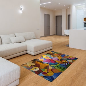 May include: A white sectional sofa with a colorful abstract rug featuring musical instruments and figures. The rug has a vibrant mix of yellow, blue, red, green, and pink colors.
