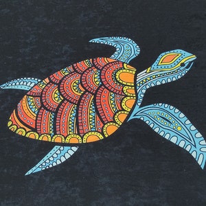 May include: A black rectangular rug featuring a colorful turtle design. The turtle has a patterned shell in orange, red, and yellow, with blue flippers and head. White geometric border on the sides.