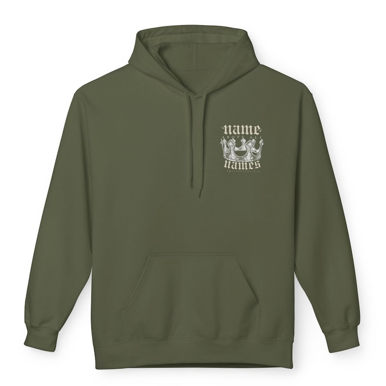 May include: A green hooded sweatshirt with a white graphic of a crown and the text "name above names" on the front.