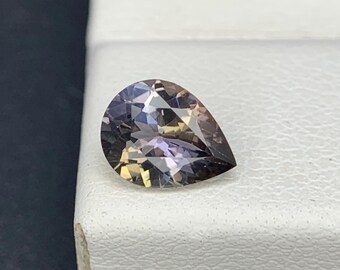 Natural Unheated Bi Color Tanzanite 0.73 Carat 7.1x5.4x3.2 MM Pear Shape Faceted Gemstone