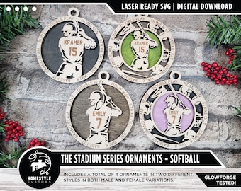 May include: Four laser-cut wood ornaments featuring a softball player in different poses. The ornaments are in black, green, brown, and purple. The text "The Stadium Series Ornaments - Softball" is at the bottom of the image. The text "Includes a total of 4 ornaments in two different styles in both male and female variations." is below the title. The text "Glowforge Tested!" is in the bottom right corner.