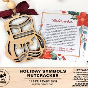 May include: Laser cut wooden Nutcracker ornament with a red ribbon and a card that reads "Nutcracker" with a festive floral design. The card includes information about the ornament and the included files. The text on the card reads "Step into the enchanting world of the season with this Nutcracker ornament, symbolizing the powerful and protective essence of tradition and joy. May it serve as a reminder of the strength and security you bring to this time of year. Like the classic Nutcracker standing tall, may your celebrations be filled with a sense of your own formidable presence and cheer. Wishing you a Merry Christmas and a joyous holiday season! Where the Nutcracker's powerful and protective presence amplifies the joy and adds a touch of magic to your festivities. Wishing you a Merry Christmas and a joyous holiday season!" The card also includes a list of files included in the download: "1 Symbol Ornament, 2 Box Designs, 2 Symbol Printables, Marketing Materials, Instructions, Glowforge & Lightburn Tested!"