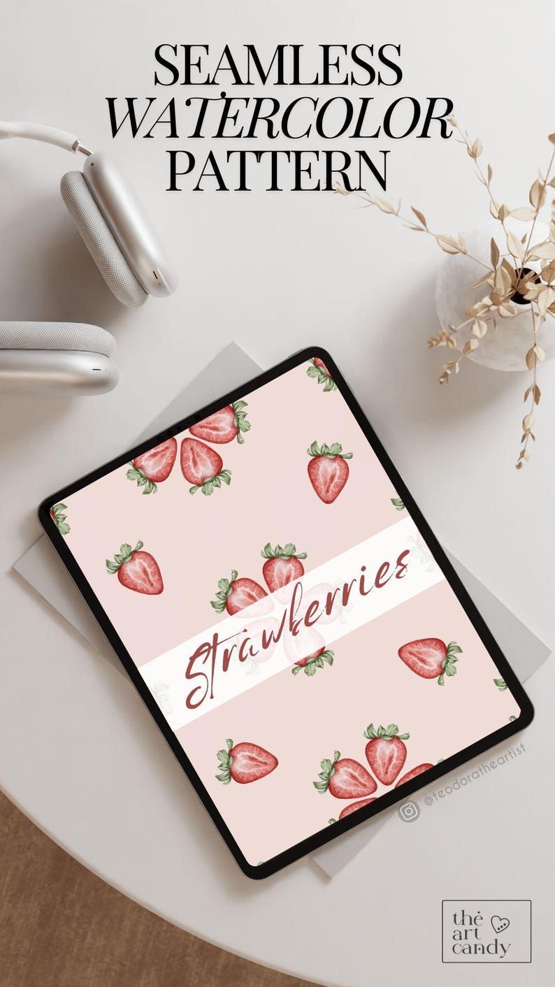 May include: A digital tablet displaying a seamless watercolor pattern of red strawberries on a pink background. The text "Strawberries" is written in white on a white banner across the screen. The text "@teodoratheartist" is in the bottom right corner of the screen.