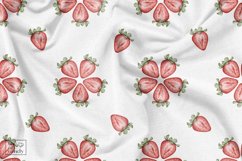 May include: A white fabric background with a repeating pattern of red strawberries. The strawberries are cut in half and arranged in a circular pattern.
