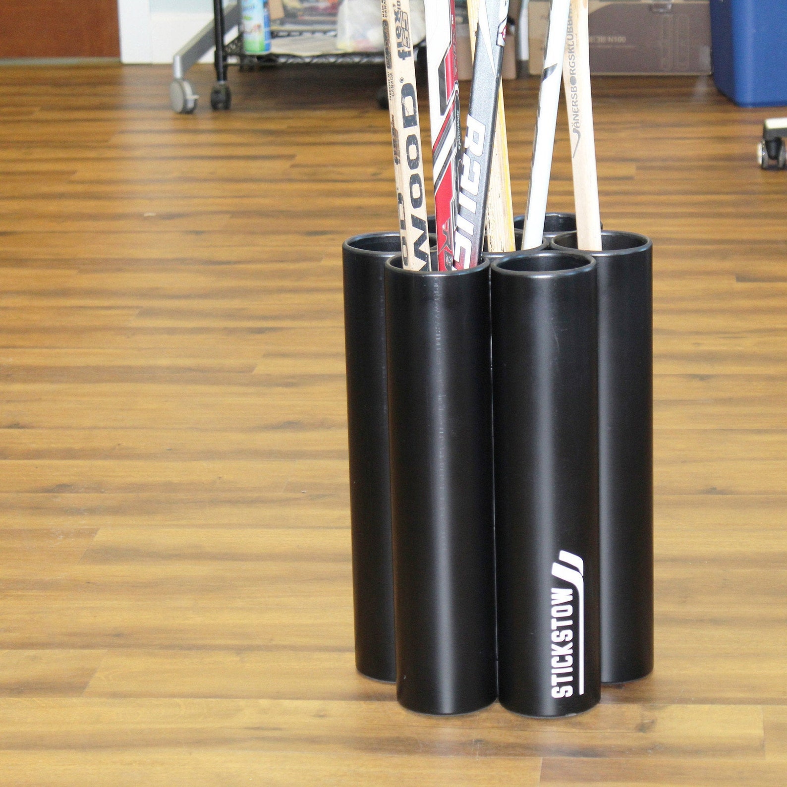 Large Hockey Stick Holder Rack Organizer is a Free Standing Stow and Go