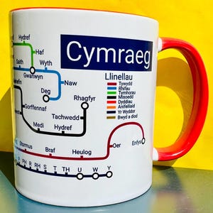 Welsh Language Learning Mug: Cymraeg Metro Design, Ceramic Coffee Cup
