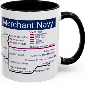 May include: A white ceramic mug with a black interior and handle, featuring a graphic design of a transit-style map titled Merchant Navy. The map includes colored lines representing Merchant Fleet, British Ports, Global Trade, Crew, Heritage, and Life at Sea, with various maritime locations and organizations labeled.