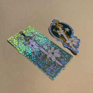 Petals on the Burial Mounds | Glitter Sticker 6cm x 3cm or 7cm x 4cm