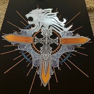 May include: A silver lion with a mane and a cross with a gold and orange design on a black background.