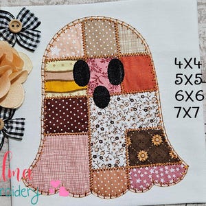 May include: A patchwork ghost design in various fabric patterns and colours, including pink, brown, and orange. The ghost has black oval eyes and mouth. The image also includes the text "4X4, 5X5, 6X6, 7X7". Decorative bows and flowers are in the image.