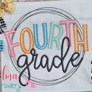 May include: Embroidered design of "Fourth Grade" in a colorful circle with a black outline. The design is available in 4x4, 5x5, 6x6, and 7x7 inch sizes.