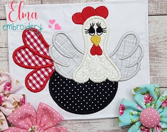 May include: A white chicken applique with a red comb, black and white polka dot body, and a red and white checkered tail. The chicken is surrounded by white fabric with the text "Elma embroidery" in the top left corner.