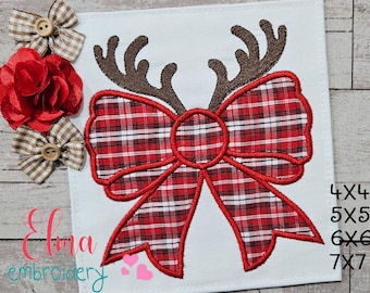 May include: Red and white plaid bow with brown reindeer antlers. The bow is outlined in red thread. The image includes the text "4x4 5x5 6x6 7x7".