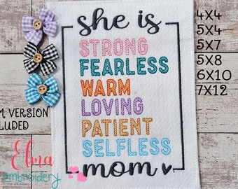 May include: Embroidered design featuring the text "She is - Strong, Fearless, Warm, Loving, Patient, Selfless, Mom" within a white frame with a heart on each side. The design is available in various sizes: 4x4, 5x4, 5x7, 5x8, 6x10, and 7x12 inches.