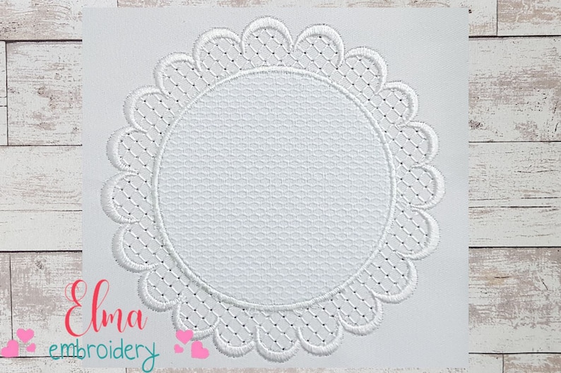 May include: White embroidery design of a circular lace doily with a scalloped edge.