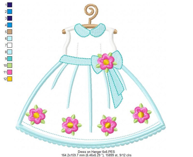 May include: A white dress with a blue sash and pink flowers embroidered on the skirt. The dress is on a hanger and has a scalloped hem.