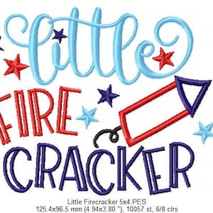 May include: An embroidery design featuring the text "little FIRE CRACKER" in light blue, red, and dark blue thread. The design includes several small stars in red, dark blue, and light blue, along with a red and dark blue firecracker icon.