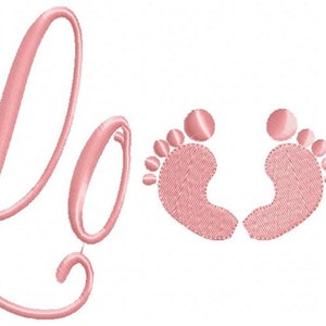 May include: Pink cursive lettering spelling "Love" with two pink baby footprints in the center.