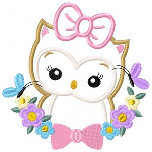 May include: A white owl with pink bows and a floral wreath. The owl has large black eyes and a yellow beak. The wreath is made of green leaves and colorful flowers.