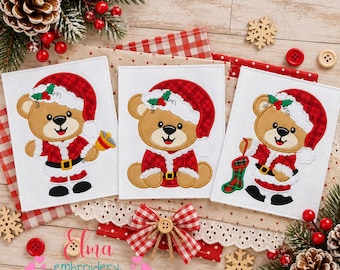 May include: Three white fabric squares featuring machine embroidery of a brown teddy bear wearing a red plaid Santa hat and coat. One bear holds a bell, one sits, and one holds a green stocking. The text Elma embroidery is visible.