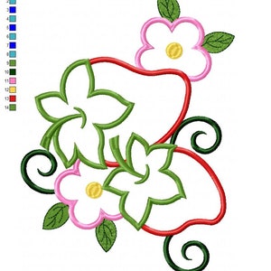 May include: Embroidered design of a strawberry with green leaves and two pink flowers with yellow centers. The design is 7 inches by 12 inches and uses 14 colors.