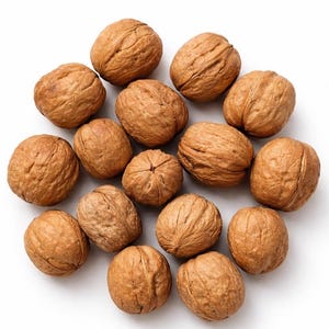 May include: A collection of fifteen whole walnuts with textured, light brown shells arranged in a loose cluster. Each walnut features a distinct, irregular surface pattern with deep ridges and a central seam, showcasing the natural organic form.