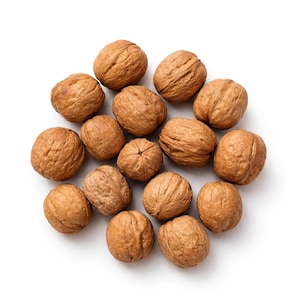 May include: A collection of fourteen whole walnuts with textured, light brown shells. Each nut features a distinct, irregular, and wrinkled surface pattern characteristic of walnut shells, arranged in a loose, circular cluster on a plain surface.