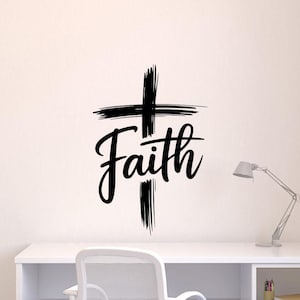May include: Black wall decal featuring the word "Faith" in elegant script, superimposed over a bold cross design. The cross and text are in a brushstroke style, creating a striking visual statement. Ideal for home decor.