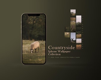 May include: A phone screen displaying a photo of a sheep grazing in a field. The phone is on a green surface. The text "Countryside Iphone Wallpaper Collection" is displayed below the phone.