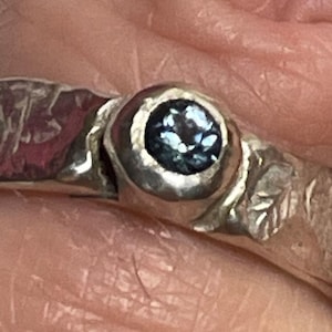 Sparkly blue natural sapphire in sterling silver bezel on large hammered band with leaves motif - genuine faceted blue sapphire ring.