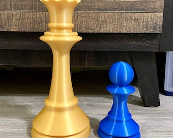 Piezas de ajedrez XL de reina dorada y peón azul