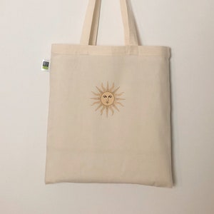 Hand-printed organic jute bag “Sun”