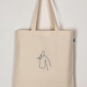 Handbestickter Bio-Jutebeutel „Bierflasche“ Stoffbeutel aus Biobaumwolle als Einkaufsbeutel Tasche oder Geschenk für Freundin Freund