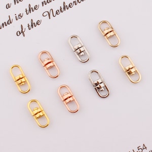 May include: Eight swivel lobster clasps in gold, silver, and rose gold finishes. The clasps are a popular choice for jewelry making and crafting.
