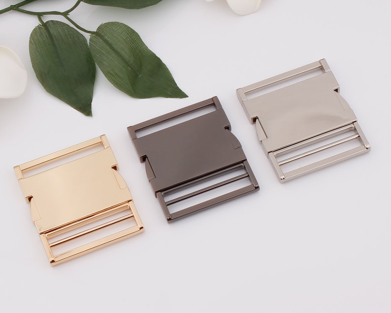 May include: Three metal buckle closures in gold, silver, and gunmetal.