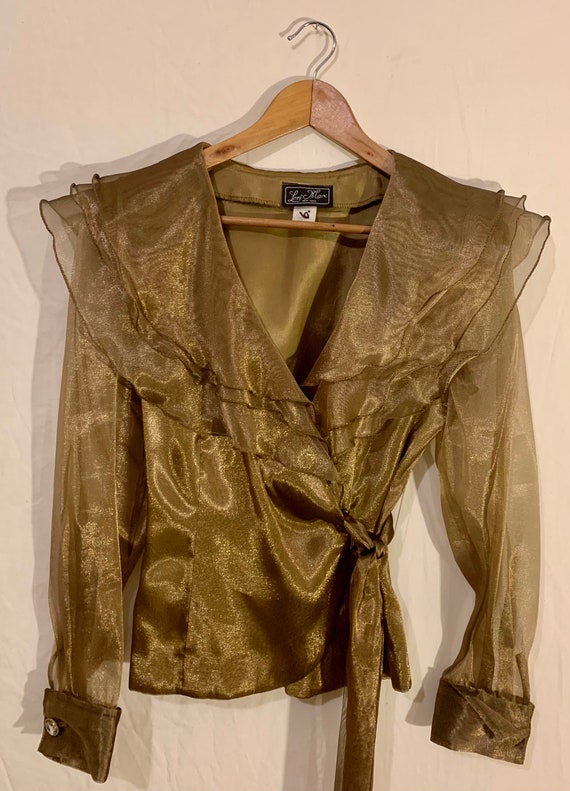 Metallic olive wrap top.