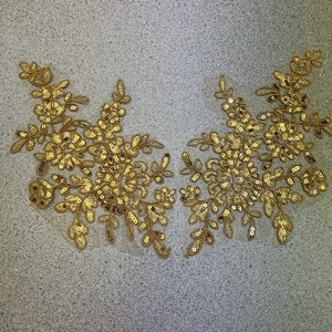 Gold lace appliqués with sequins