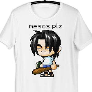 May include: White t-shirt featuring a pixelated anime-style character with black hair and a baseball bat. The text "mesos plz" is printed above the character. The shirt is hanging on a black hanger.