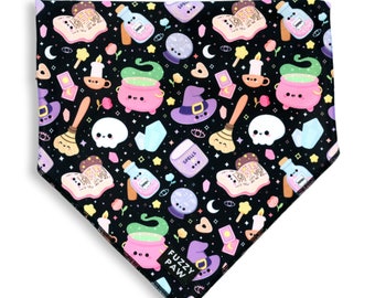 May include: Black bandana with a whimsical pattern of cauldrons, potion bottles, crystal balls, and other witchy items. The bandana has the text "Fuzzy Paw" in white.