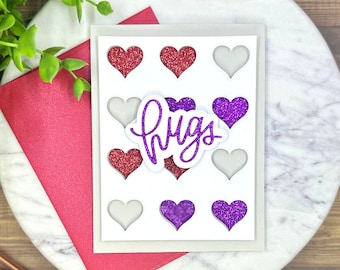 Glitter Hugs Greeting Card | Red & Purple Heart Note