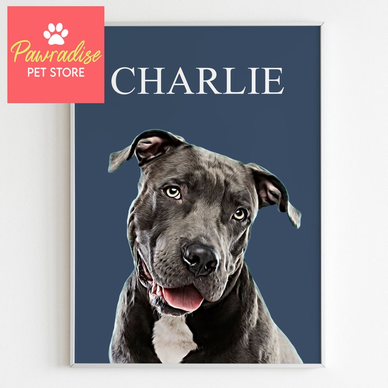 May include: A framed portrait of a gray dog with the name "CHARLIE" in white text on a navy blue background. The dog has a white patch on its chest and a pink tongue. The upper left corner has a logo that says "Pawradise PET STORE".